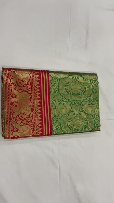 Royal Green Soft Lichi Silk Saree with Grand Copper Gold Pallu
