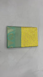 Lemon Yellow Lichi Silk Saree with Elegant Sea Green Border