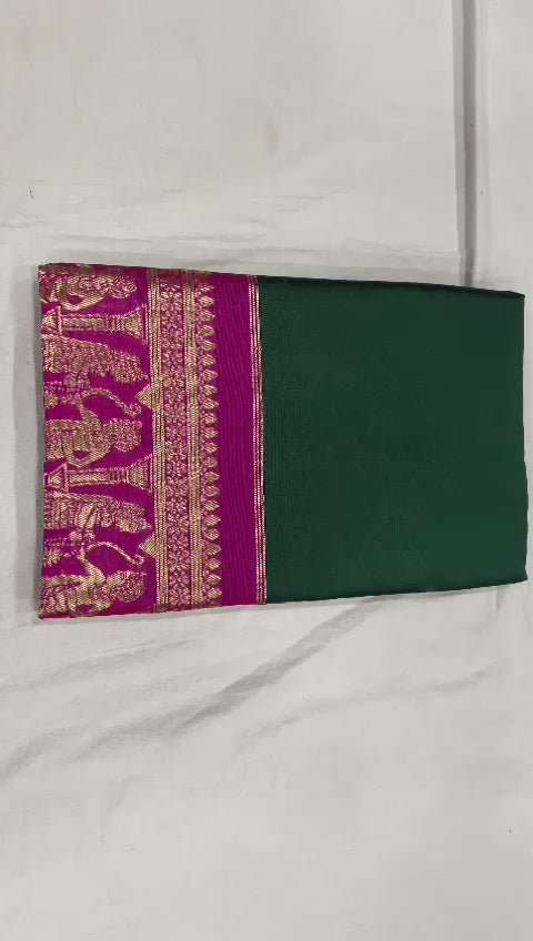 Royal Green Soft Lichi Silk Saree with Rani Pink Temple Border