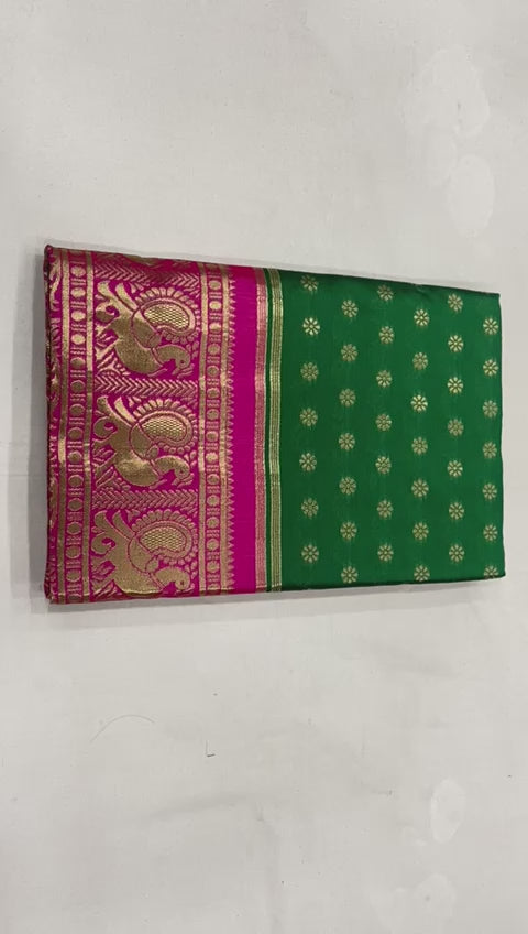 Emerald Green Lichi Silk Saree with Royal Pink Zari Border