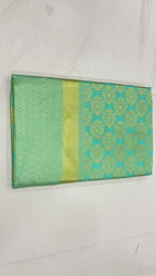 Mint Green Lichi Silk Saree with Elegant Golden Weave