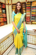 Lemon Yellow Lichi Silk Saree with Elegant Sea Green Border