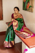 Emerald Green Lichi Silk Saree with Royal Pink Zari Border